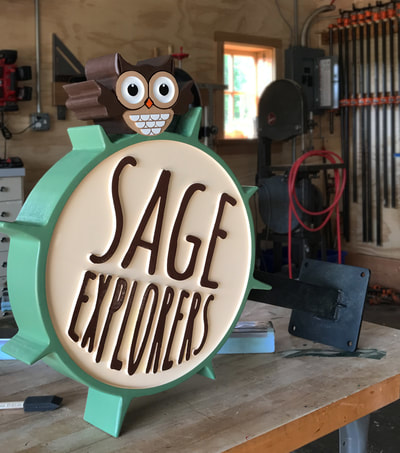 Lake Forest Wooden Signs Sage Explorers Wooden Sign Company CNC Cut Blade Signage Elkhorn Wisconsin North Shore